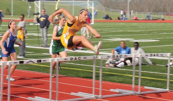 Flying High Junior Kyaunna Robinson stays in the lead during her favorite event, hurdles. 