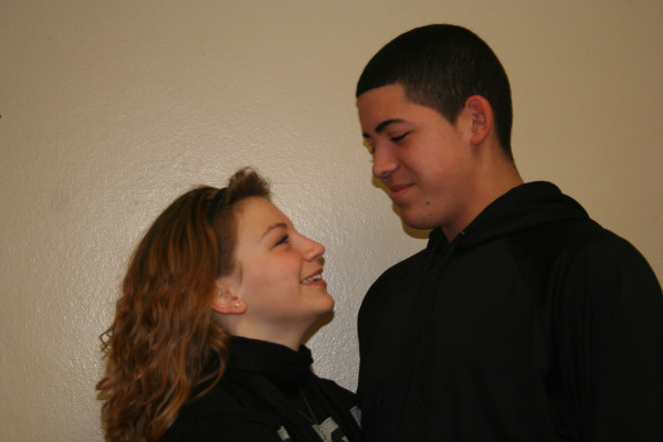 Gazing into each other’s eyes are sophomores Breanna Warnes and Jairo Mendez. The couple have been      together for about eight months and it will be nine months on Valentine’s Day, February 14. “My favorite part about dating him is probably how comfortable I am around him. I can be silly, goofy, and immature and he doesn’t think I’m completely insane. At least I hope not. I also like how he can tell me when I do something that I shouldn’t, like if I’m rude to someone, he’ll call me out on it. He keeps me in check,” said Warnes. 