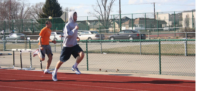  Freshman Dominic Lopez and senior Sam Vollbrecht push it to the limit during training. Both the boys’ and girls’ track teams this year are hoping to have many people qualify for state as in previous years. The season for track began Feb. 27. 