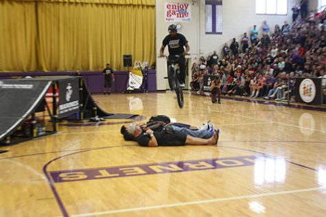 In this image, we see the ASA jumping over the students on the floor. "It was freaking crazy to be involved in that," said senior David Walker.