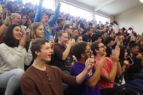 In this image, we see the crowd getting pumped up while watching the tricks on the ramps and with the participants.