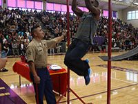 At the end of the assembly, ASA invited some students to come and break the Marine record for pull-ups, which is 37. Senior Calvin Rivers did 21.