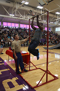 At the end of the assembly, ASA invited some students to come and break the Marine record for pull-ups, which is 37. Senior Calvin Rivers did 21.