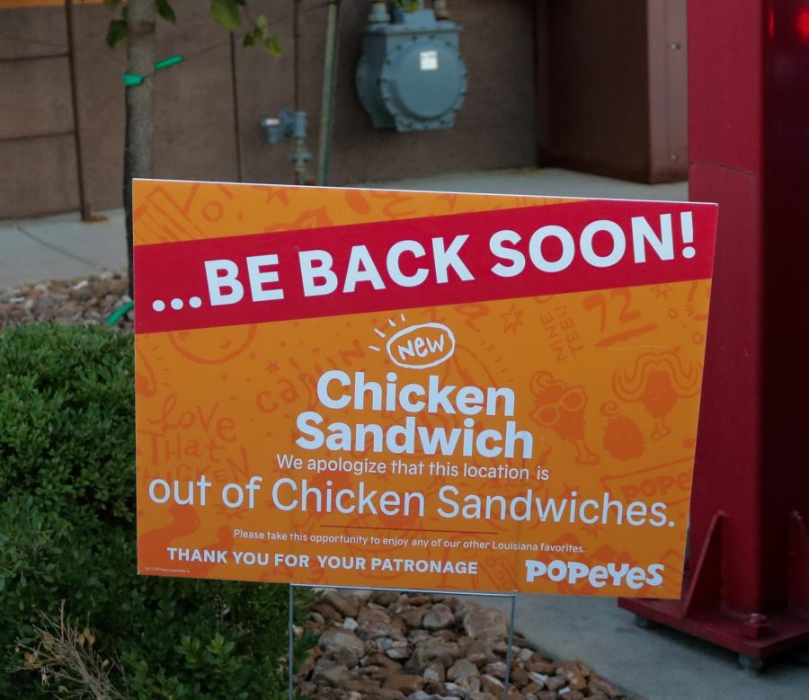 Sign outside of Popeyes informing customers of the absence. Popeyes is currently selling chicken sandwiches again. 