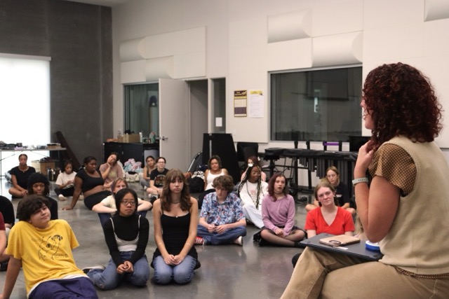 Mrs. Lacy Cunningham speaking to the auditionees